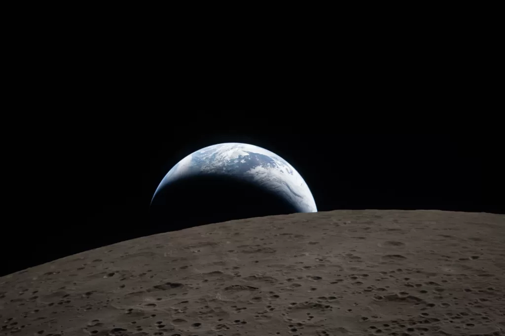 The Artemis II captured this view of Earth setting as they flew around the Moon.